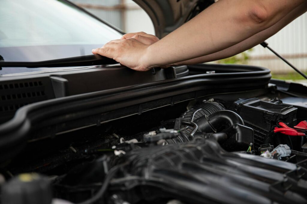 Picture of an under-the-hood inspection for vehicle maintenance. — prepare vehicle towing Las Vegas holidays