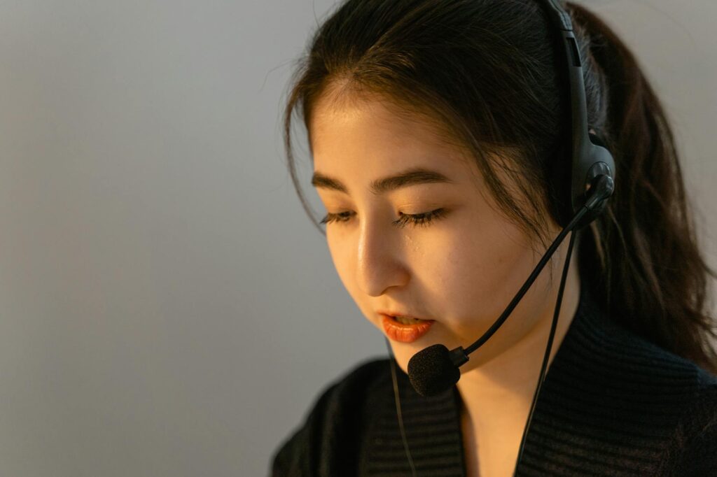 A customer service representative assisting a caller for towing services. — emergency towing Las Vegas