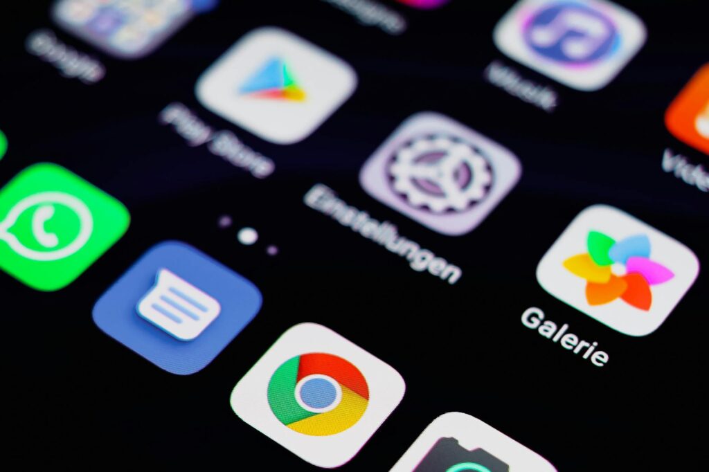 A visual showing a smartphone with towing service apps open — find cheap towing Las Vegas