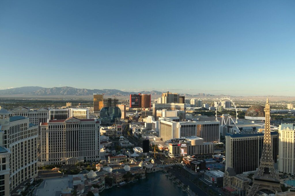 An image of a tow truck in Las Vegas with a clear view of the city skyline. — hiring cheap tow truck Las Vegas