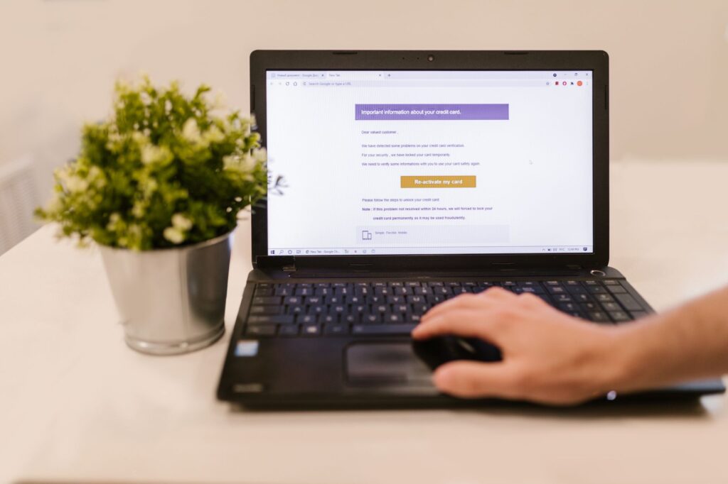 A customer reading online reviews on a laptop. — affordable towing Las Vegas
