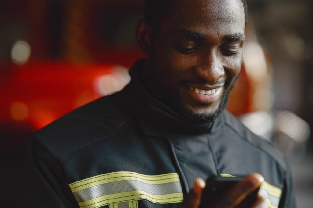 A person using a smartphone to compare towing service prices. — affordable towing Las Vegas