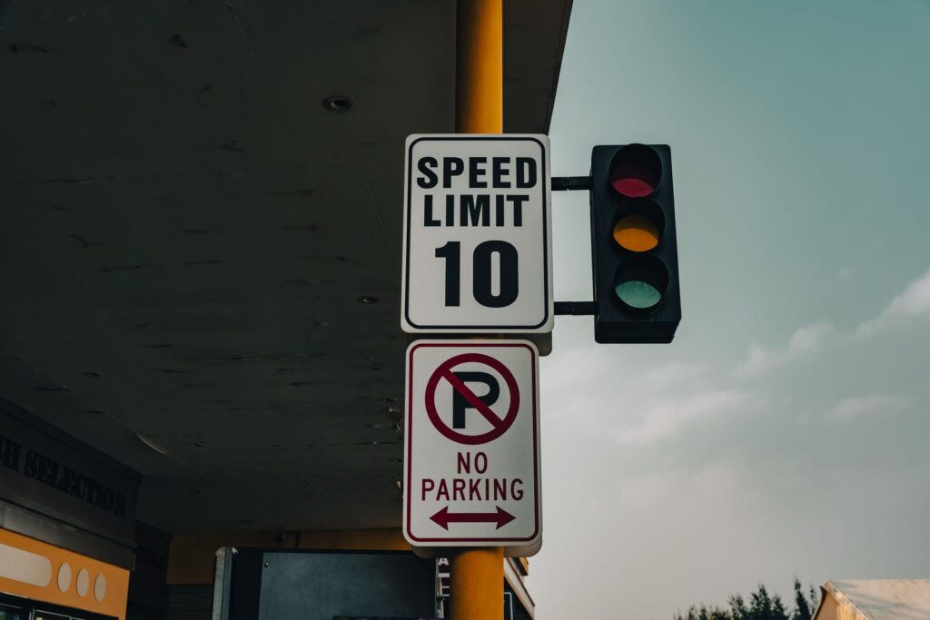 A photo showing a typical Las Vegas parking sign with rules and regulations displayed. — las vegas parking rules