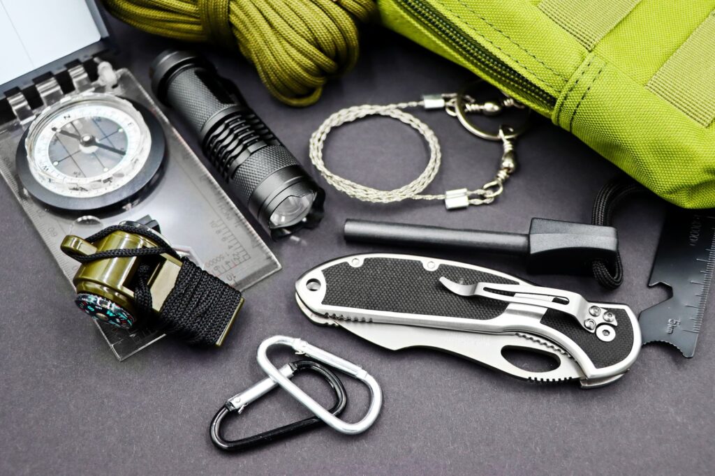 Essential items in a roadside emergency kit displayed on a table — emergency towing Las Vegas